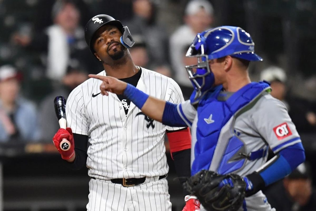 Apr 15, 2024; Chicago, Illinois, USA; Chicago White Sox pinch hitter Eloy Jimenez (74) reacts after striking out next to Kansas City Royals catcher Freddy Fermin (34) during the ninth inning at Guaranteed Rate Field. All players wore #42 in honor of Jackie Robinson Day.