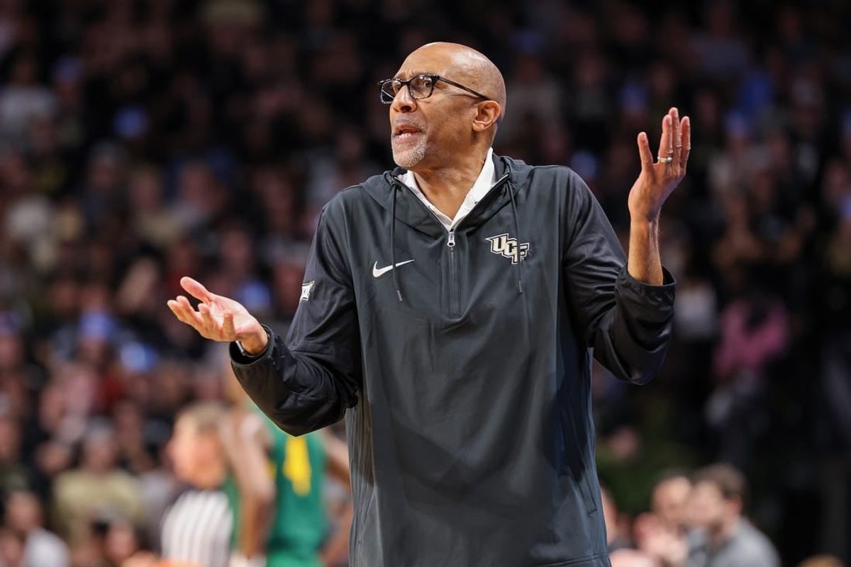Jan 31, 2024; Orlando, Florida, USA; UCF Knights head coach Johnny Dawkins reacts to a call during the first half against the Baylor Bears at Addition Financial Arena.