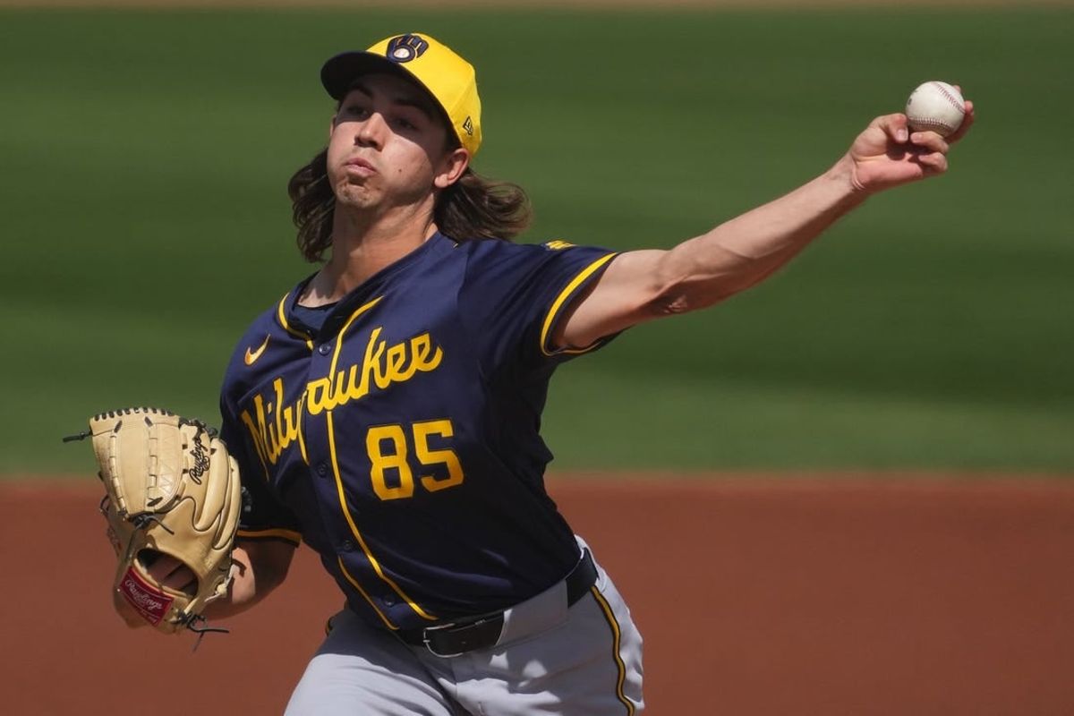 Mar 14, 2024; Peoria, Arizona, USA; Milwaukee Brewers starting pitcher Robert Gasser pitches against the Seattle Mariners during the first inning at Peoria Sports Complex.