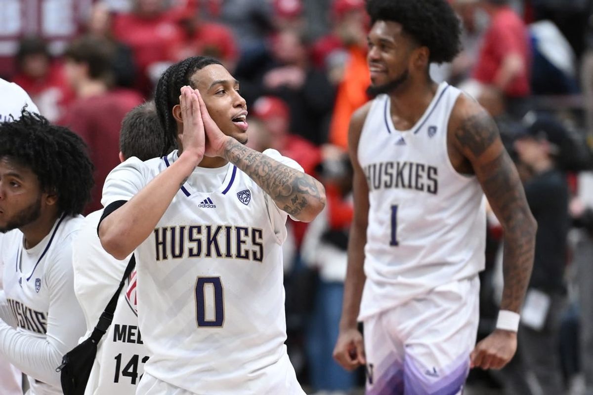 Mar 7, 2024; Pullman, Washington, USA; Washington Huskies guard Koren Johnson (0) celebrates after a game against the Washington State Cougars at Friel Court at Beasley Coliseum. Washington Huskies won 74-68.