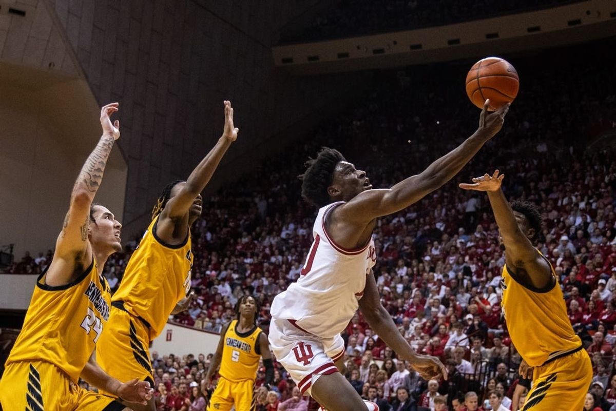 Dec 29, 2023; Bloomington, Indiana, USA; Indiana Hoosiers forward Kaleb Banks (10) shoots the ball while Kennesaw State Owls defend in the first half at Simon Skjodt Assembly Hall.