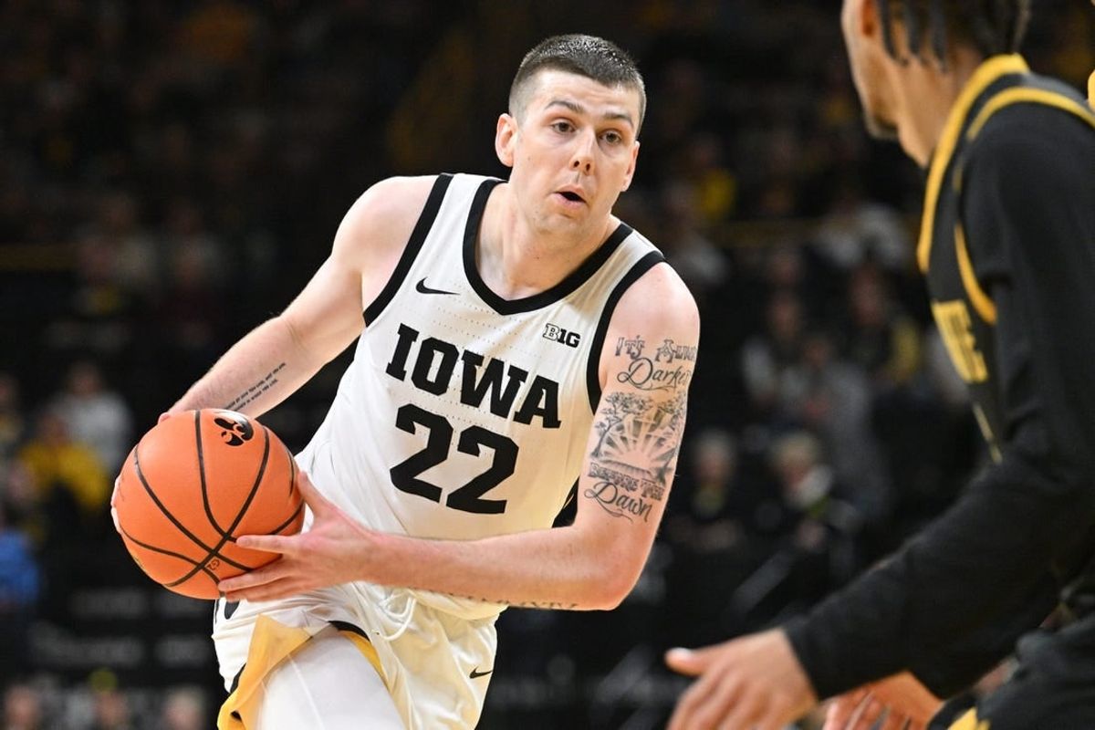 Nov 10, 2023; Iowa City, Iowa, USA; Iowa Hawkeyes forward Patrick McCaffery (22) goes to the basket against the Alabama State Hornets during the first half at Carver-Hawkeye Arena.