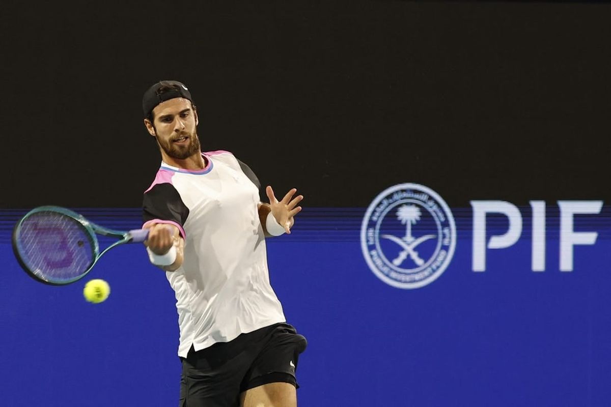 Mar 26, 2024; Miami Gardens, FL, USA; Karen Khachanov hits a forehand against Alexander Zverev (GER) (not pictured) on day nine of the Miami Open at Hard Rock Stadium.