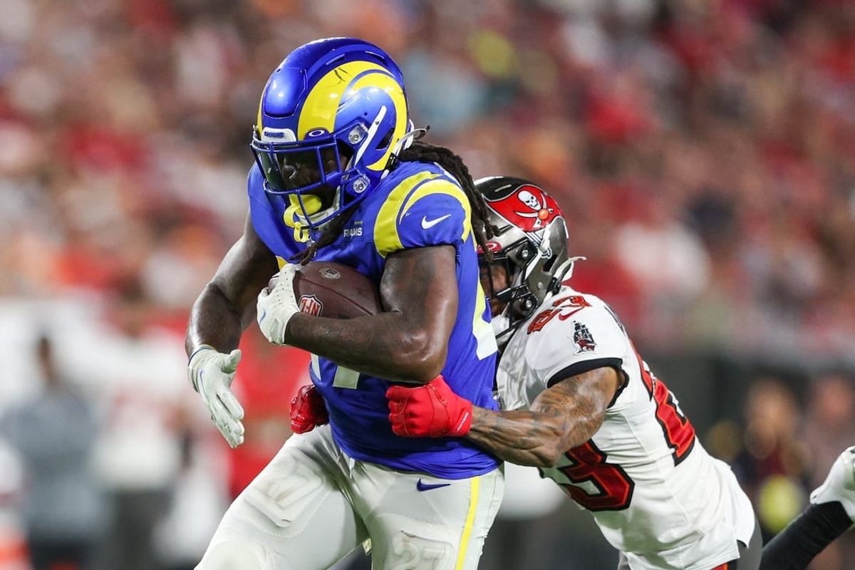 Nov 6, 2022; Tampa, Florida, USA;  Los Angeles Rams running back Darrell Henderson Jr. (27) is tackled by Tampa Bay Buccaneers cornerback Sean Murphy-Bunting (23) in the third quarter at Raymond James Stadium.