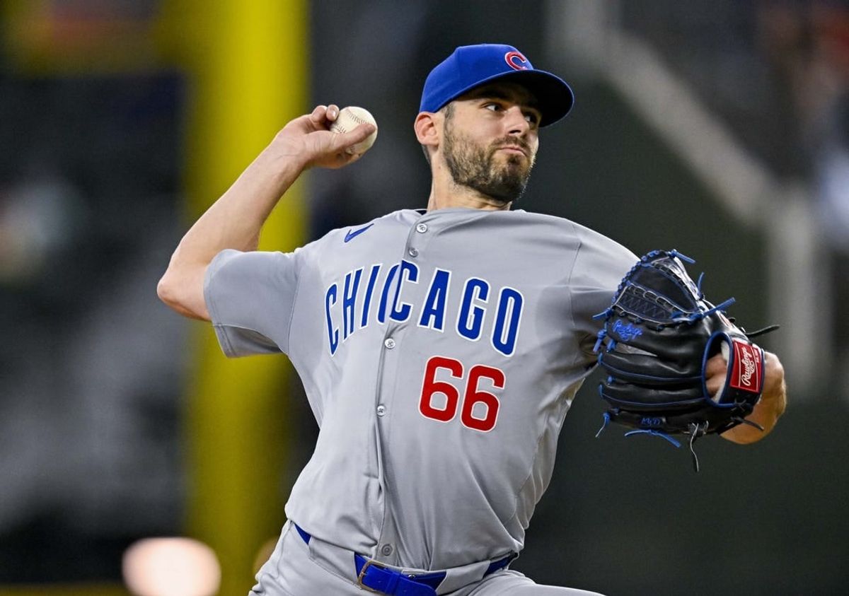 Mar 31, 2024; Arlington, Texas, USA; Chicago Cubs relief pitcher Julian Merryweather (66) pitches during the game between the Texas Rangers and the Chicago Cubs at Globe Life Field.