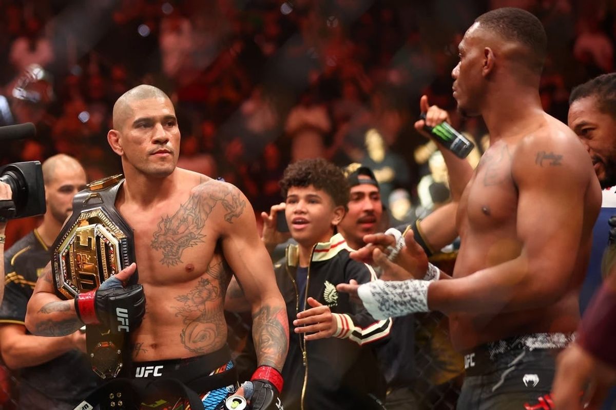 Apr 13, 2024; Las Vegas, Nevada, USA; Alex Pereira (red gloves) reacts after defeating Jamahal Hill (blue gloves) during UFC 300 at T-Mobile Arena.