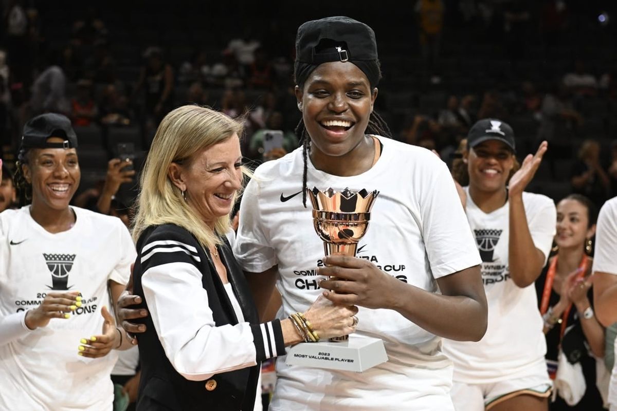 Aug 15, 2023; Las Vegas, Nevada, USA; WNBA Commissioner Cathy Engelbert hands New York Liberty forward Jonquel Jones the MVP trophy for the Commissioner   s Cup Championship game after defeating the Las Vegas Aces at Michelob Ultra Arena.