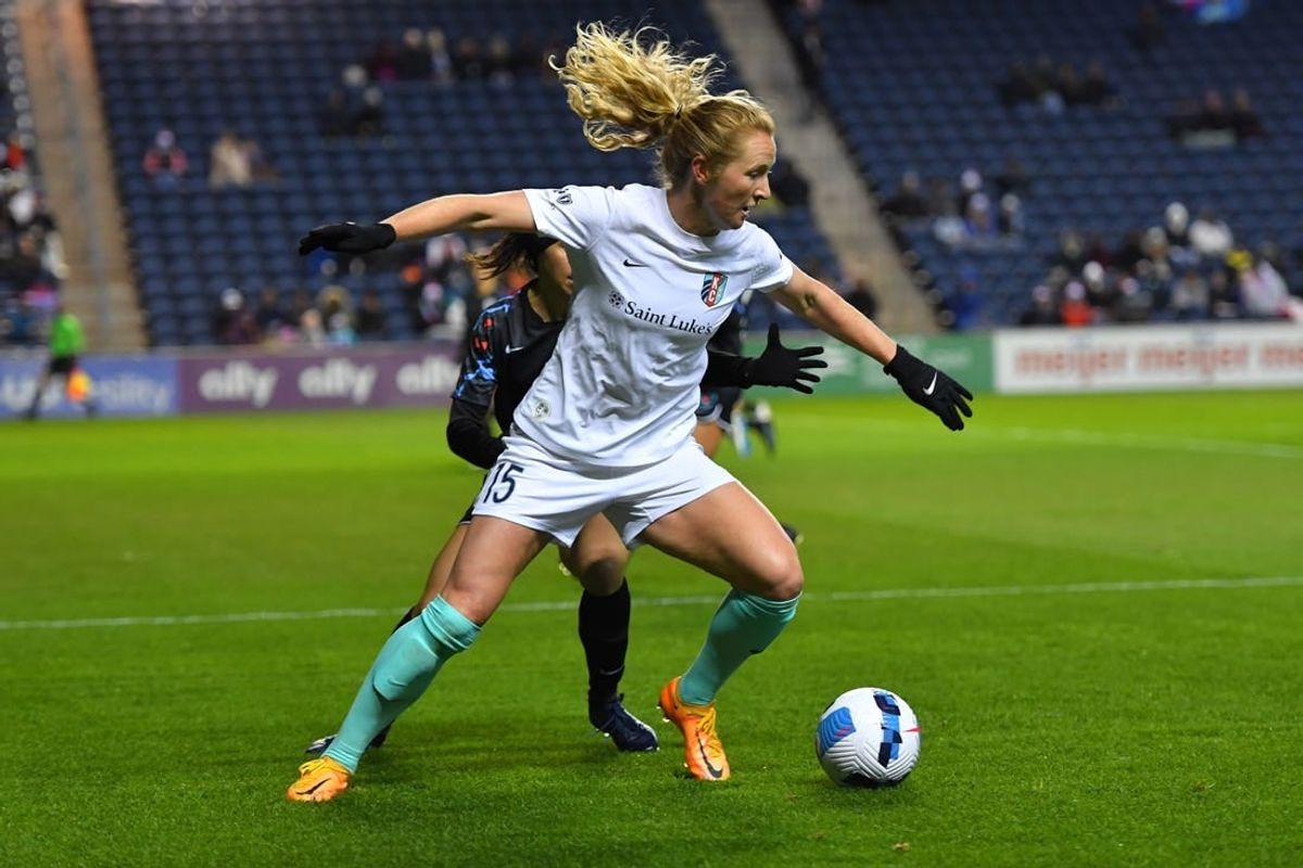 Mar 25, 2022; Bridgeview, IL, USA; Kansas City Current midfielder Sam Mewis (15) runs the ball during first half against Chicago Red Stars in a NWSL Challenge Cup match at SeatGeek Stadium.