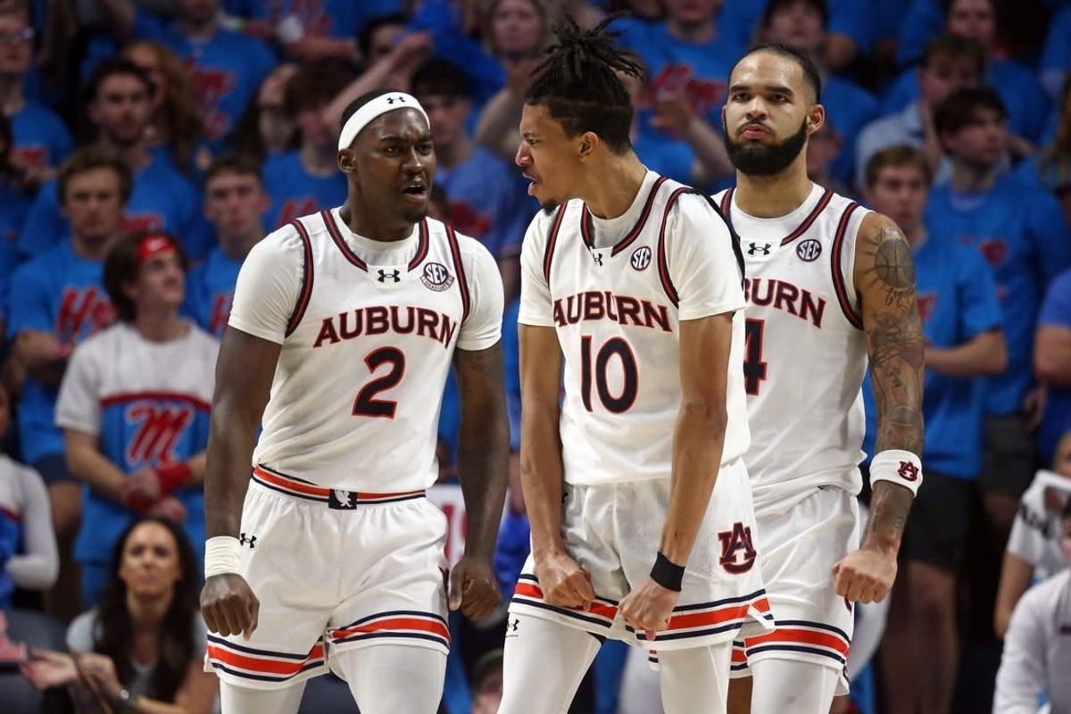 Feb 3, 2024; Oxford, Mississippi, USA; Auburn Tigers guard/forward Chad Baker-Mazara (10) reacts with forward Jaylin Williams (2) and forward/center Johni Broome (4) after a dunk during the second half against the Mississippi Rebels at The Sandy and John Black Pavilion at Ole Miss.