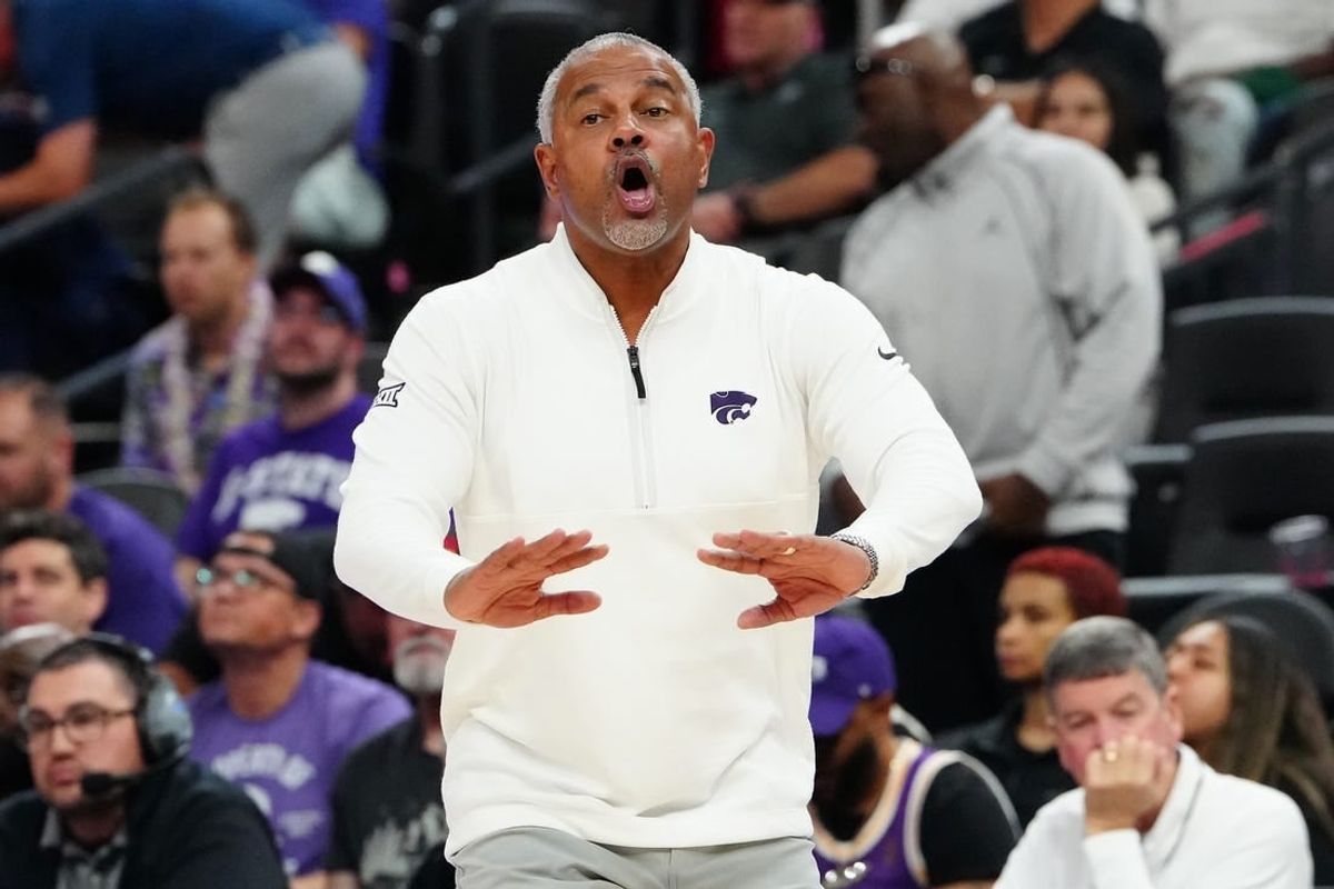 Nov 6, 2023; Las Vegas, Nevada, USA; Kansas State Wildcats head coach Jerome Tang talks to a player before the USC Trojans inbound the ball during the second half at T-Mobile Arena.