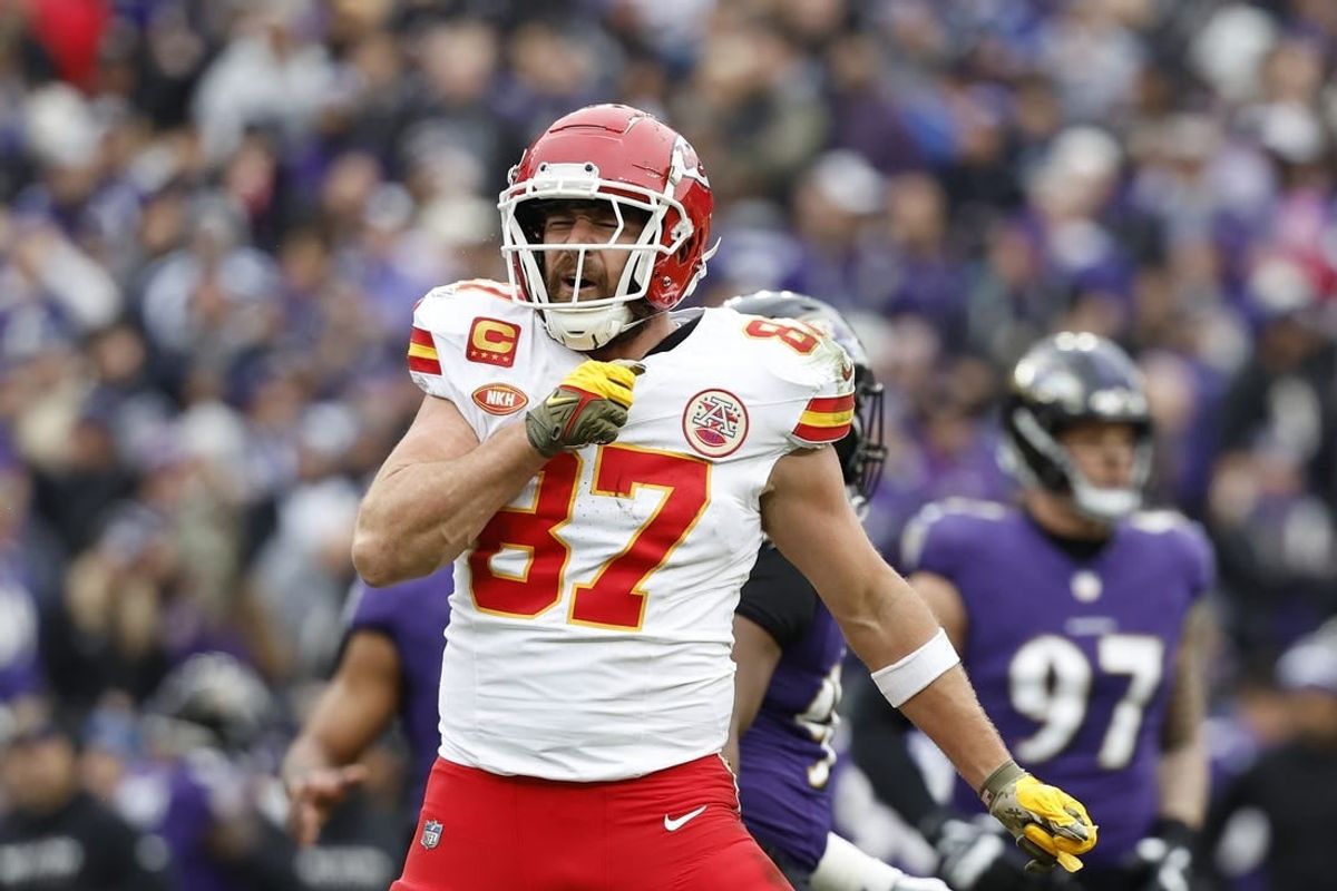 Jan 28, 2024; Baltimore, Maryland, USA; Kansas City Chiefs tight end Travis Kelce (87) celebrates after scoring a touchdown against the Baltimore Ravens during the first half in the AFC Championship football game at M&T Bank Stadium.