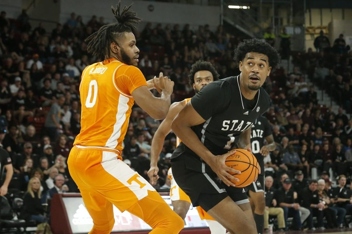 Jan 17, 2023; Starkville, Mississippi, USA; Mississippi State Bulldogs forward Tolu Smith (1) spins toward the basket as Tennessee Volunteers forward Jonas Aidoo (0) defends during the second half at Humphrey Coliseum.