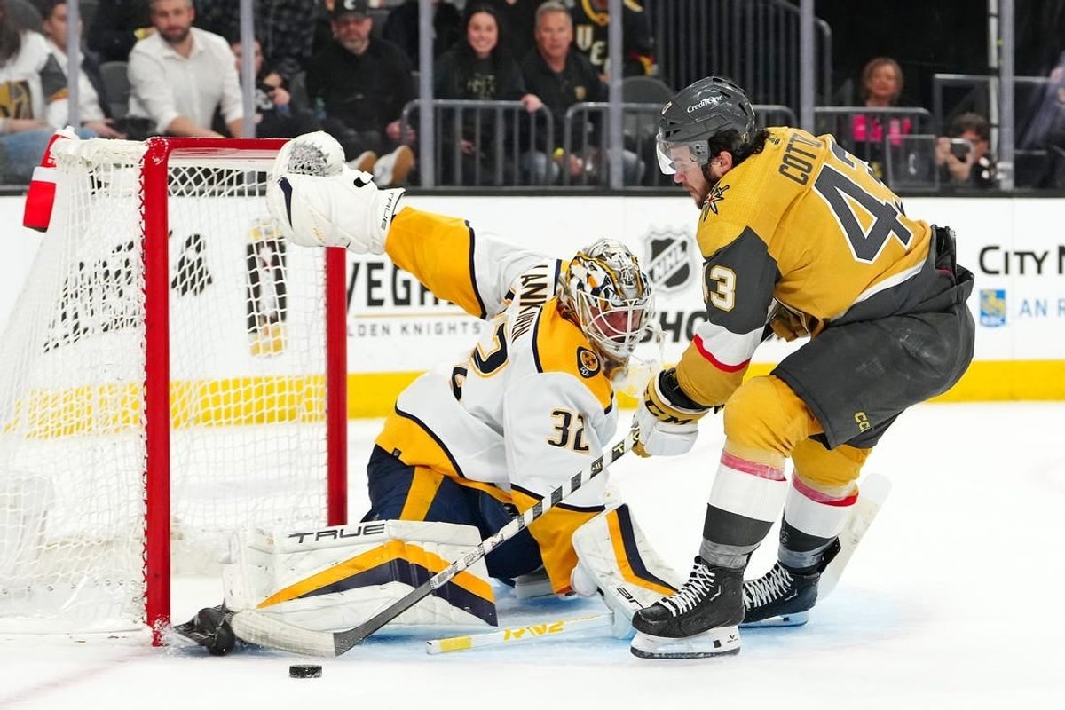 Feb 20, 2024; Las Vegas, Nevada, USA; Vegas Golden Knights center Paul Cotter (43) shoots against Nashville Predators goaltender Kevin Lankinen (32) during the second period at T-Mobile Arena.