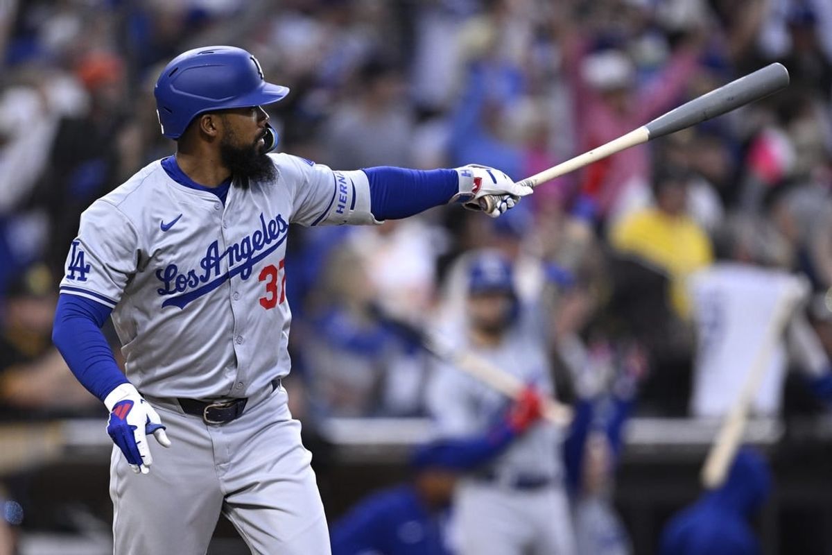 May 11, 2024; San Diego, California, USA; Los Angeles Dodgers left fielder Teoscar Hernandez (37) hits a grand slam home run during the sixth inning against the San Diego Padres at Petco Park.