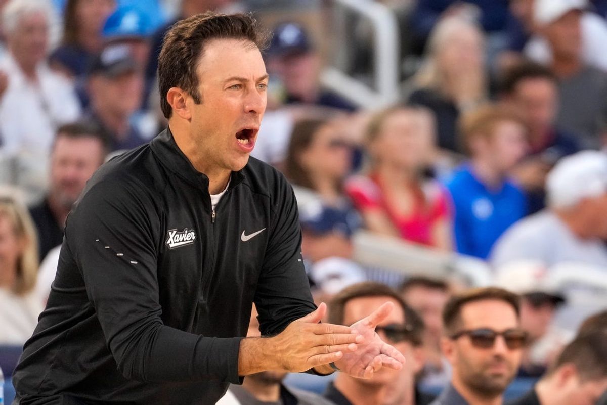 Xavier Musketeers head coach Richard Pitino shouts to his defense in the first half of the CareSource Invitational exhibition game between the Xavier Musketeers and the Dayton Flyers at the Lindner Family Tennis Center in Mason, Ohio, Wednesday, Oct. 7, 2026.