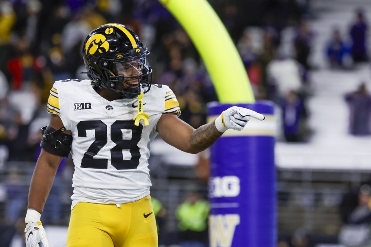 Oct 9, 2026; Seattle, Washington, USA; Iowa Hawkeyes running back Kamari Moulton (28) celebrates after rushing for a touchdown against the Washington Huskies during the fourth quarter at Husky Stadium. Mandatory Credit: Joe Nicholson-Imagn Images