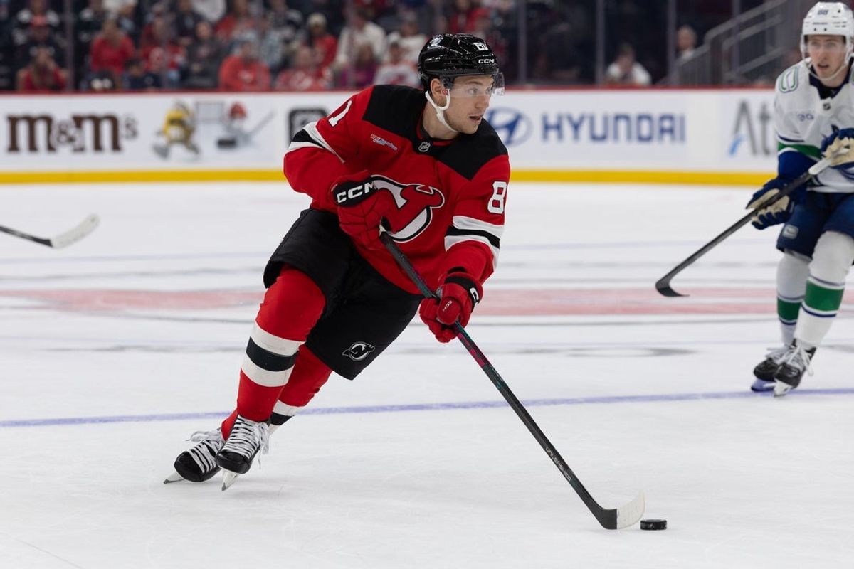 Oct 10, 2026; Newark, New Jersey, USA;  New Jersey Devils right wing Arseny Gritsyuk (81) controls the puck against the Vancouver Canucks during the second period at Prudential Center.  Mandatory Credit: Thomas Salus-Imagn Images