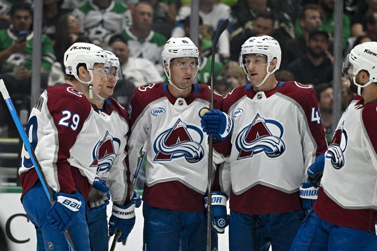 Oct 13, 2026; Dallas, Texas, USA; Colorado Avalanche left wing Artturi Lehkonen (62) and center Nathan MacKinnon (29) and defenseman Josh Manson (42) and center Martin Necas (88) and defenseman Brent Burns (84) celebrates a goal scored by Lehkonen against the Dallas Stars during the first period at the American Airlines Center. Mandatory Credit: Jerome Miron-Imagn Images