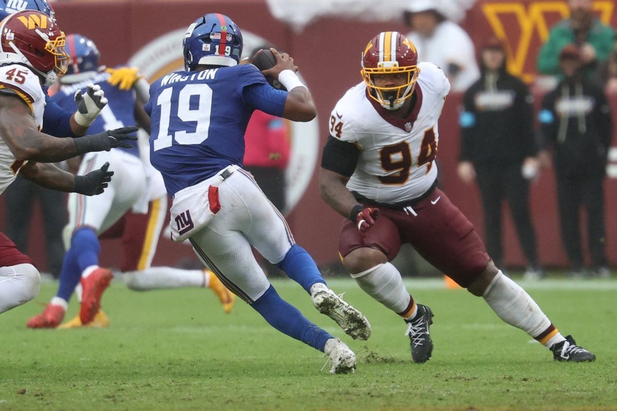 Oct 11, 2026; Landover, Maryland, USA; Washington Commanders defensive tackle Daron Payne (94) chases New York Giants quarterback Jameis Winston (19) at Northwest Stadium. Mandatory Credit: Geoff Burke-Imagn Images