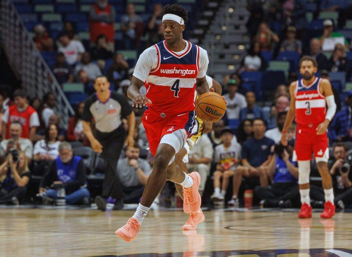 Oct 16, 2026; New Orleans, Louisiana, USA;  Washington Wizards forward AJ Dybantsa (4) brings the ball up court against New Orleans Pelicans during the first half at Smoothie King Center.  Mandatory Credit: Stephen Lew-Imagn Images