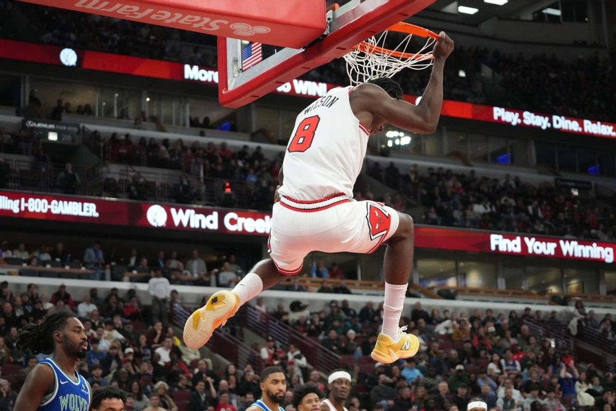 Oct 16, 2026; Chicago, Illinois, USA;  Chicago Bulls forward Caleb Wilson (8) dunks the ball against the Minnesota Timberwolves during the first half at United Center.  Mandatory Credit: David Banks-Imagn Images