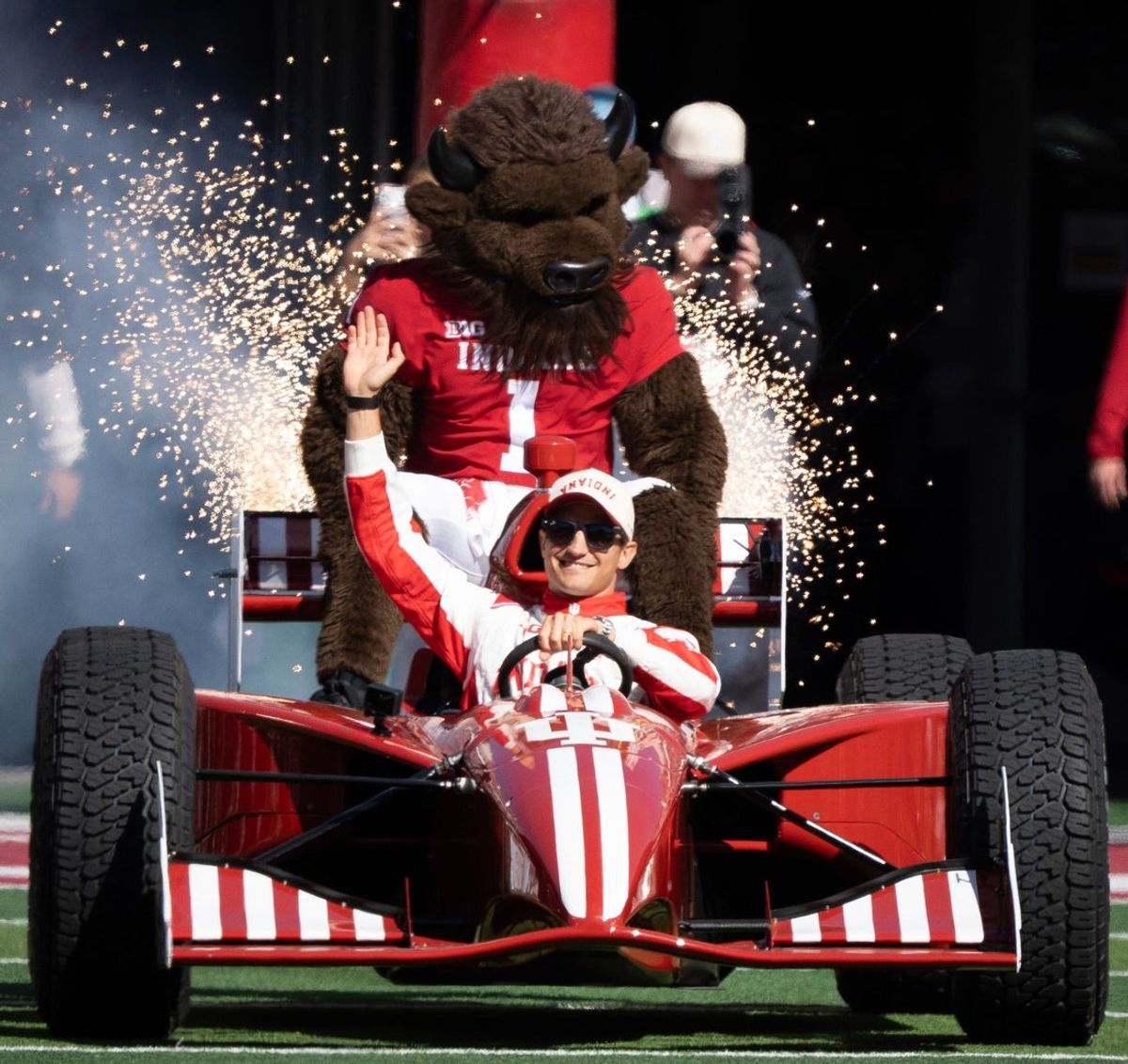 Alex Palou drives out the Indy Car before the Indiana versus Ohio State football game at Memorial Stadium on Saturday, Oct. 17, 2026.