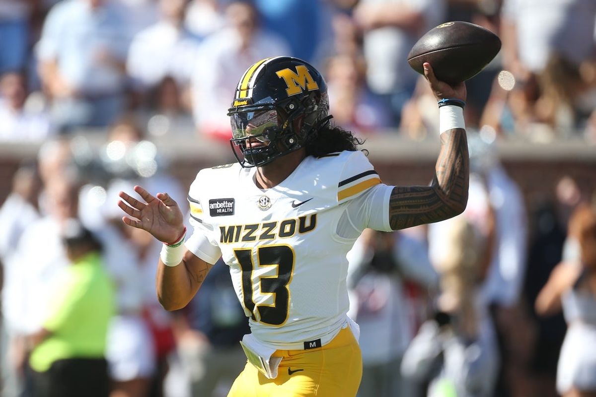 Oct 17, 2026; Oxford, Mississippi, USA;  Missouri Tigers quarterback Austin Simmons (13) throws a pass during the first quarter against the Mississippi Rebels at Vaught-Hemingway Stadium.  Mandatory Credit: Petre Thomas-Imagn Images