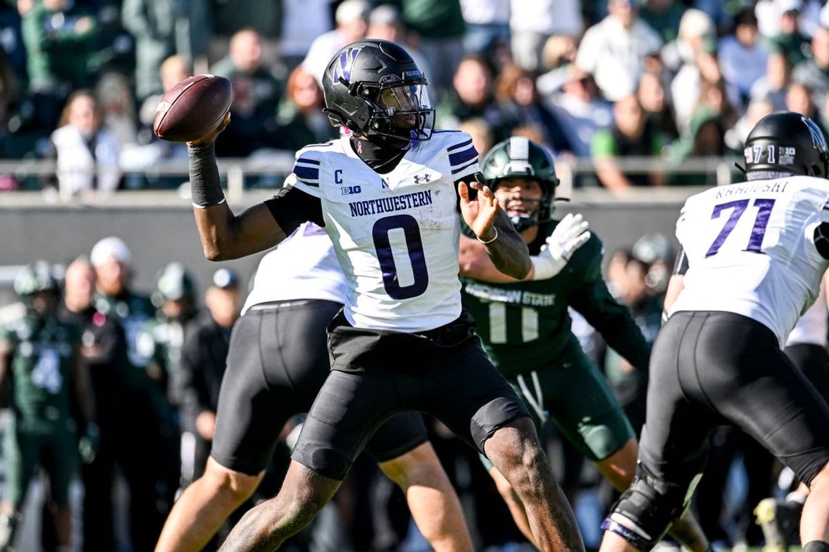 Northwestern’s Aidan Chiles throws a pass against Michigan State during the fourth quarter on Saturday, Oct. 17, 2026, at Spartan Stadium in East Lansing.