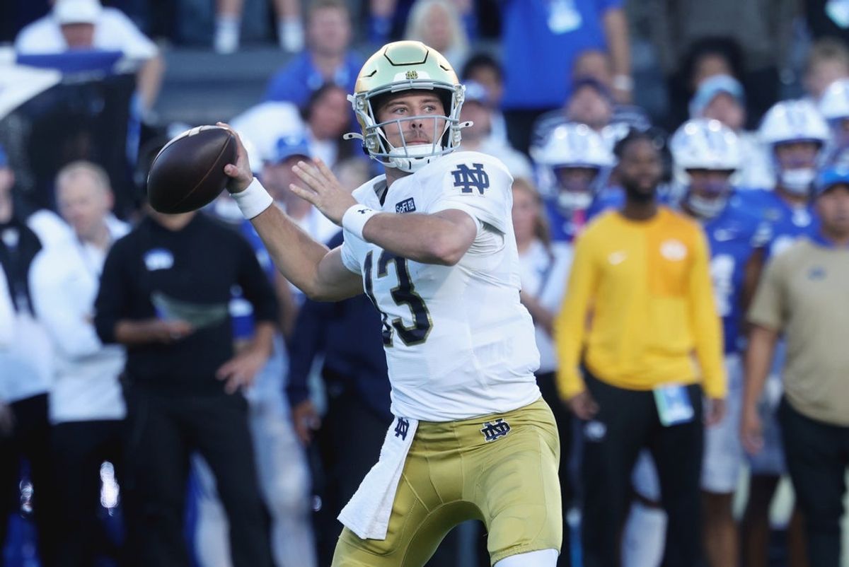 Oct 17, 2026; Provo, Utah, USA;  Notre Dame Fighting Irish quarterback CJ Carr (13) passes against the Brigham Young Cougars during the first half at LaVell Edwards Stadium.  Mandatory Credit: Rob Gray-Imagn Images