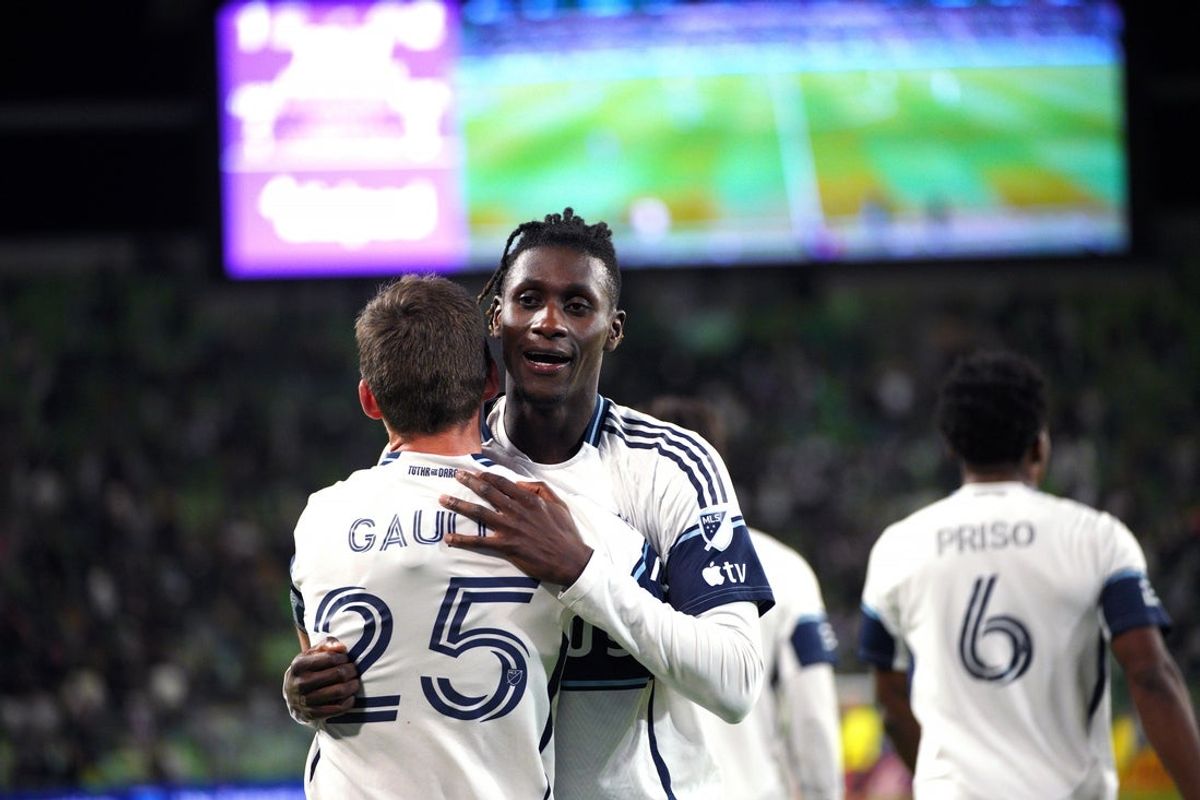 Oct 17, 2026; Austin, Texas, USA;  Vancouver Whitecaps FC forward Yadaly Diaby (77) celebrates a goal with midfielder Ryan Gauld (25) during the second half against Austin FC at Q2 Stadium.  Mandatory Credit: Dustin Safranek-Imagn Images