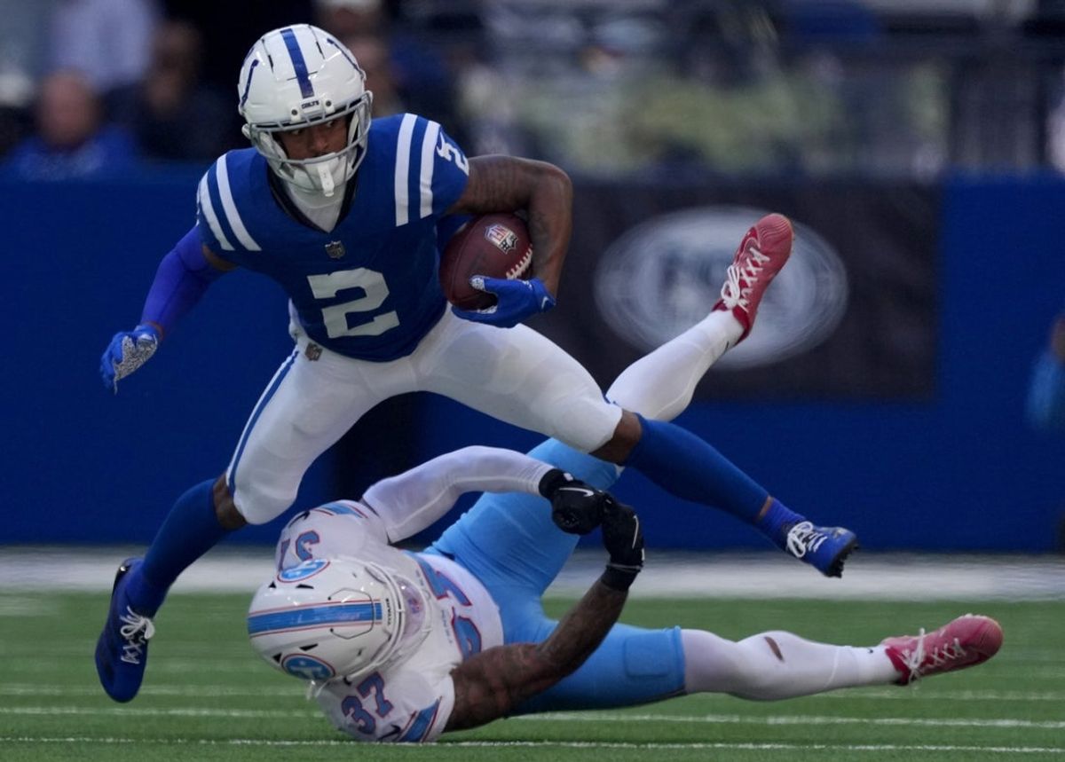 Indianapolis Colts wide receiver Josh Downs (2) pulls in a pass and reaches the first down marker Sunday, Oct. 18, 2026, during the game against the Tennessee Titans at Lucas Oil Stadium in Indianapolis.
