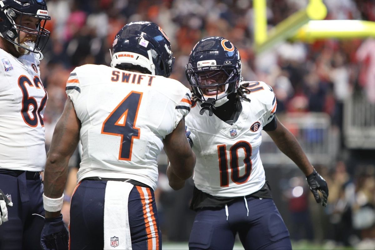 Oct 18, 2026; Atlanta, Georgia, USA;  Chicago Bears running back D'Andre Swift (4) and wide receiver Luther Burden III (10) celebrates after scoring against the Atlanta Falcons during the second quarter at Mercedes-Benz Stadium.  Mandatory Credit: Brett Davis-Imagn Images