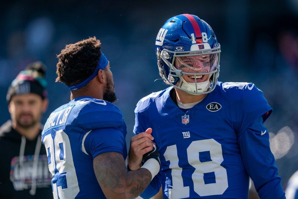 New York Giants quarterback J.J. McCarthy (18) and New York Giants running back Tyrone Tracy Jr. (29) during a week 6 NFL football game between New York Giants and New Orleans Saints on Sunday, Oct. 18, 2026, at MetLife Stadium in East Rutherford, NJ.