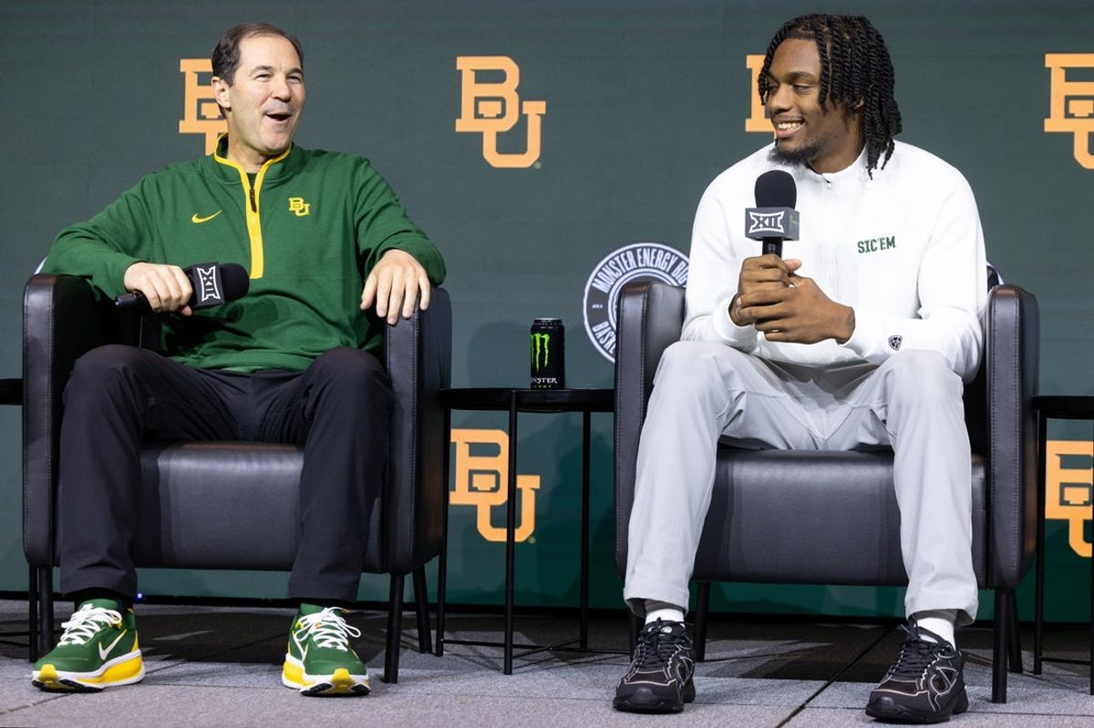 Oct 20, 2026; Kansas City, MO, USA;  Baylor player Kayden Mingo and coach Scott Drew interview during the Big 12 Media Days event at T-Mobile Center.  Mandatory Credit: William Purnell-Imagn Images