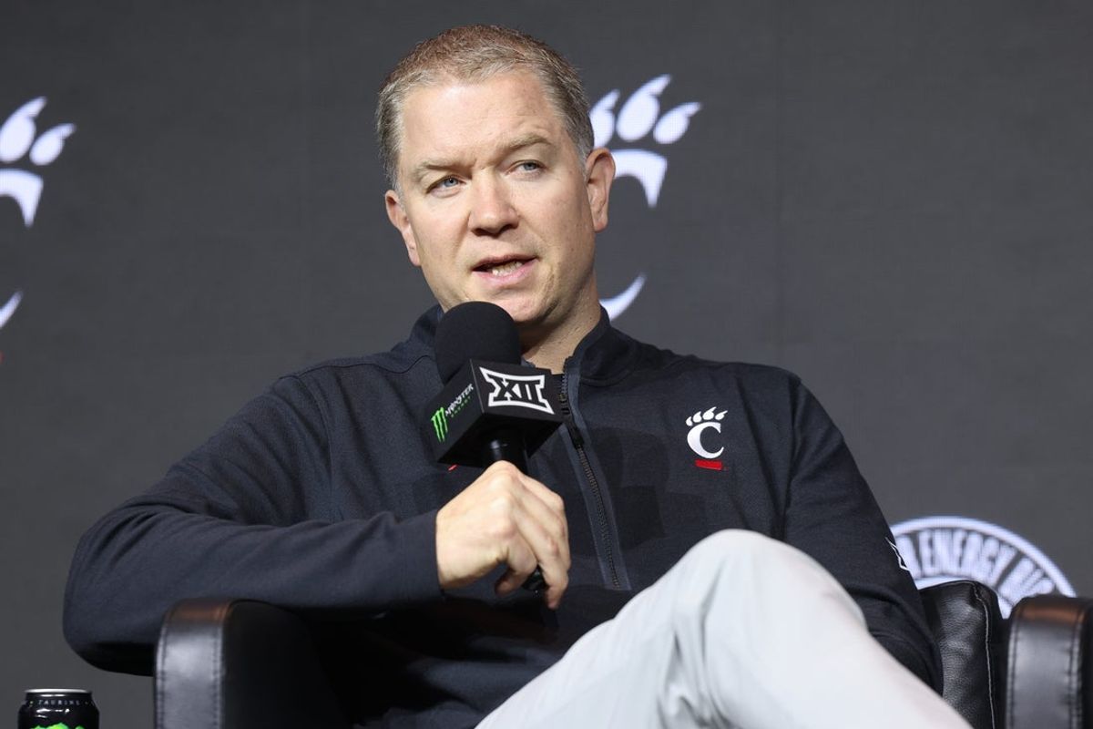 Oct 20, 2026; Kansas City, MO, USA;  Cincinnati coach Jerrod Calhoun interviews during the Big 12 Media Days event at T-Mobile Center.  Mandatory Credit: William Purnell-Imagn Images