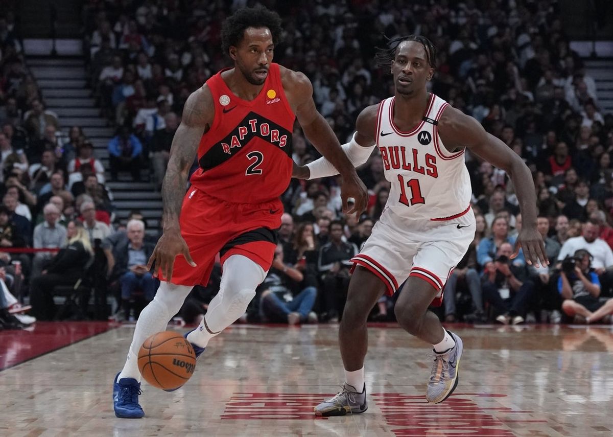 Oct 21, 2026; Toronto, Ontario, CAN;  Toronto Raptors forward Khawhi Leonard (2) dribbles against Chicago forward Leonard Miller (11) during the first quarter at Scotiabank Arena.  Mandatory Credit: Nick Turchiaro-Imagn Images