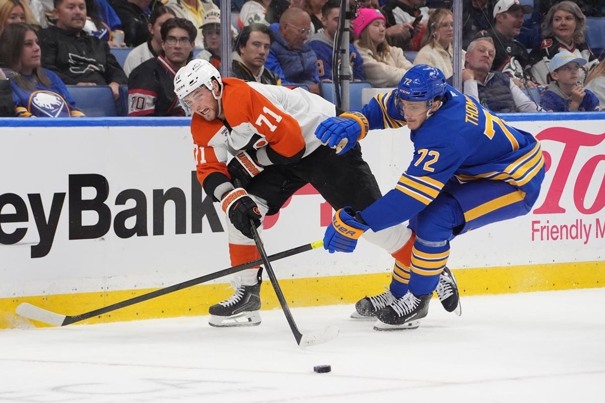 Oct 21, 2026; Buffalo, New York, USA;  Philadelphia Flyers right wing Tyson Foerster (71) and Buffalo Sabres center Tage Thompson (72) battle for the puck during the third period at KeyBank Center.  Mandatory Credit: Gregory Fisher-Imagn Images