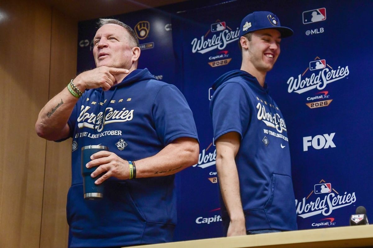 Oct 22, 2026; Milwaukee, WI, USA;  Milwaukee Brewers manager Pat Murphy greets starting pitcher Jacob Misiorowski (32) during an interview before the 2026 World Series.  Mandatory Credit: Benny Sieu-Imagn Images