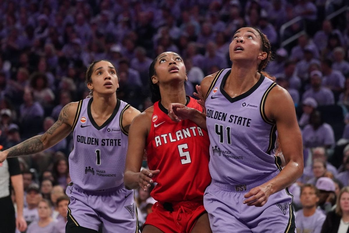 Oct 19, 2026; San Francisco, California, USA; Golden State Valkyries forward Gabby Williams (1), center Kiah Stokes (41), and Atlanta Dream forward Angel Reese (5) look for a rebound in the third quarter in game two of the 2026 WNBA Finals at Chase Center. Mandatory Credit: David Gonzales-Imagn Images