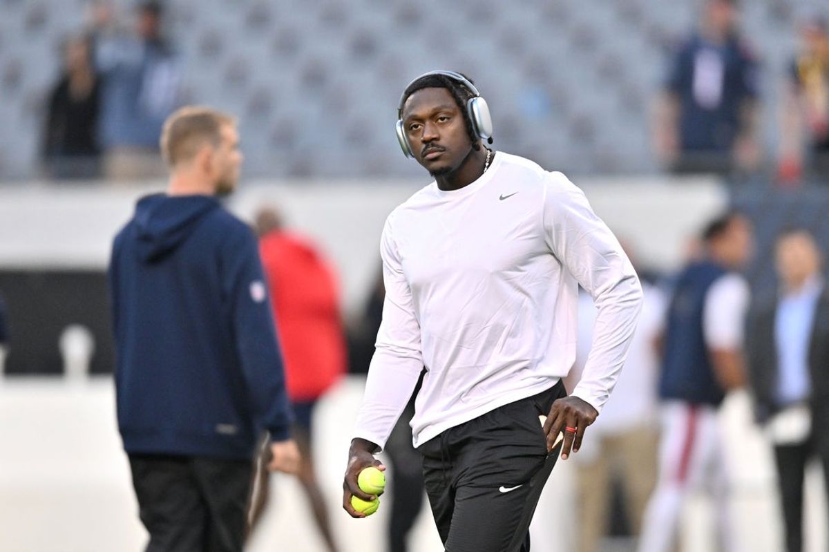 Oct 22, 2026; Chicago, Illinois, USA;  New England Patriots wide receiver A.J. Brown (1) warms up prior to the game against the Chicago Bears at Soldier Field.  Mandatory Credit: Patrick Gorski-Imagn Images