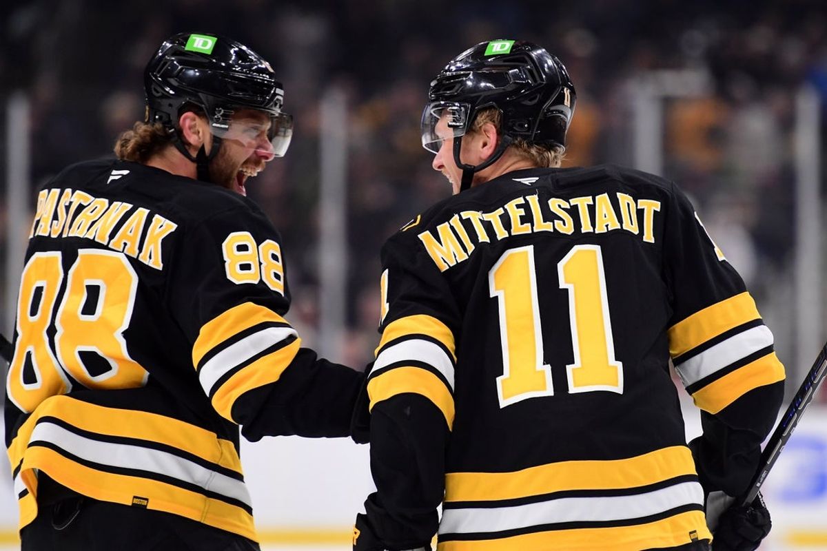 Oct 22, 2026; Boston, Massachusetts, USA;  Boston Bruins right wing David Pastrnak (88) reacts after a goal by center Casey Mittelstadt (11) during the first period at TD Garden. Mandatory Credit: Bob DeChiara-Imagn Images