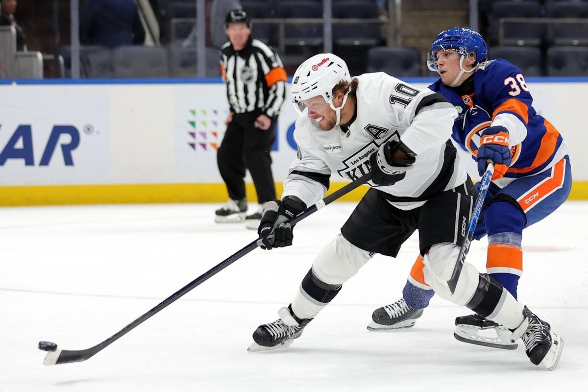 Oct 22, 2026; Elmont, New York, USA; Los Angeles Kings left wing Artemi Panarin (10) takes a shot against New York Islanders right wing Victor Eklund (38) during the first period at UBS Arena. Mandatory Credit: Brad Penner-Imagn Images