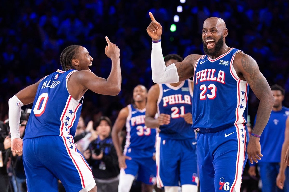 Oct 22, 2026; Philadelphia, Pennsylvania, USA; Philadelphia 76ers forward LeBron James (23) and Tyrese Maxey celebrate after a score against the Cleveland Cavaliers during the fourth quarter at Xfinity Mobile Arena. Mandatory Credit: Bill Streicher-Imagn Images