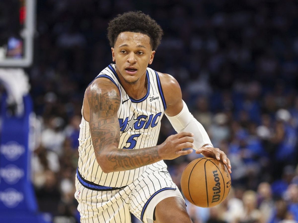 Oct 23, 2026; Orlando, Florida, USA; Orlando Magic forward Paolo Banchero (5) controls the ball against the Minnesota Timberwolvesin the first quarter at Kia Center. Mandatory Credit: Nathan Ray Seebeck-Imagn Images
