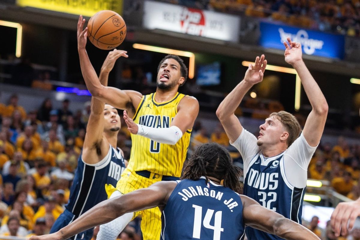 Oct 23, 2026; Indianapolis, Indiana, USA;  Indiana Pacers guard Tyrese Haliburton (0) shoots the ball while the Dallas Mavericks defends in the first half at Gainbridge Fieldhouse.  Mandatory Credit: Trevor Ruszkowski-Imagn Images