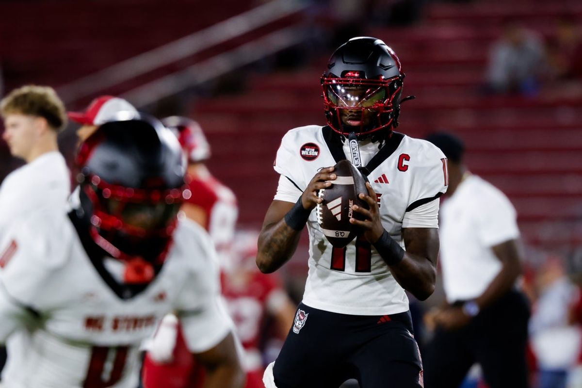 Oct 23, 2026; Stanford, California, USA;  NC State Wolfpack quarterback CJ Bailey (11) warms up before the game against the Stanford Cardinal at Stanford Stadium.  Mandatory Credit: Sergio Estrada-Imagn Images