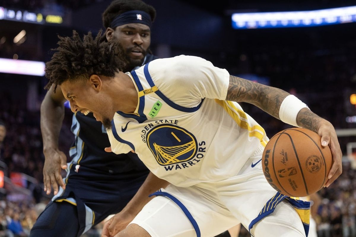 Oct 23, 2026; San Francisco, California, USA;  Golden State Warriors forward Yale Lendeborg (1) drives around Memphis Grizzlies forward Isaiah Stewart (28) during the fourth quarter at Chase Center.  Mandatory Credit: D. Ross Cameron-Imagn Images