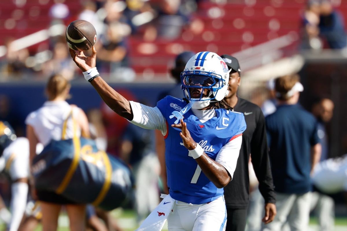 Oct 24, 2026; Dallas, Texas, USA;  SMU Mustangs quarterback Kevin Jennings (7) warm up before the game against the California Golden Bears at Gerald J. Ford Stadium.  Mandatory Credit: Chris Jones-Imagn Images