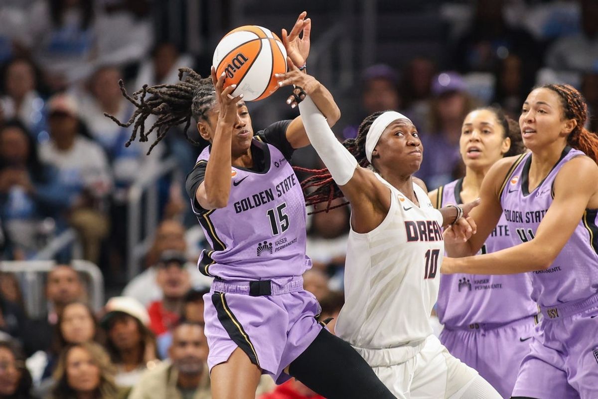 Oct 24, 2026; Atlanta, Georgia, USA; Golden State Valkyries guard Tiffany Hayes (15) reaches for a rebound over Atlanta Dream guard Rhyne Howard (10) in the second quarter during game four of the 2026 WNBA Finals at State Farm Arena. Mandatory Credit: Brett Davis-Imagn Images