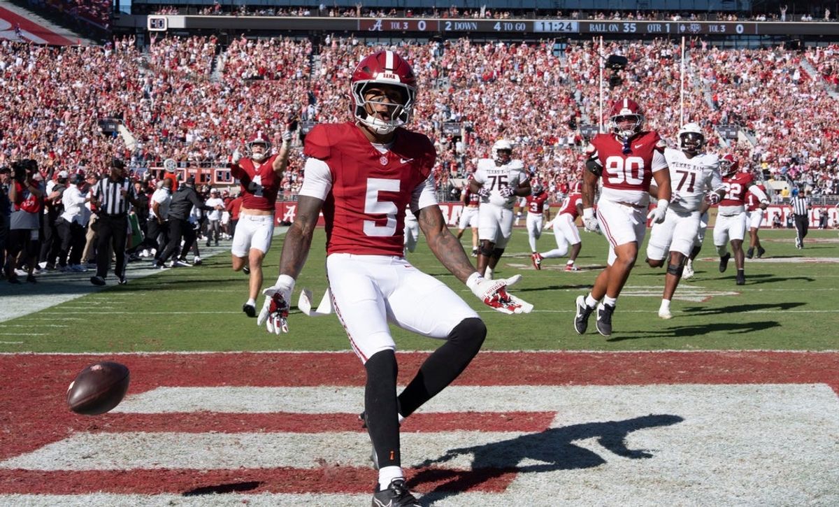 Oct 24, 2026; Tuscaloosa, AL, USA;  Alabama Dijon Lee Jr. (5) celebrates his interception and resulting touchdown against Texas A&M at Saban Field at Bryant Denny Stadium. Mandatory Credit: Gary Cosby Jr.-Tuscaloosa News